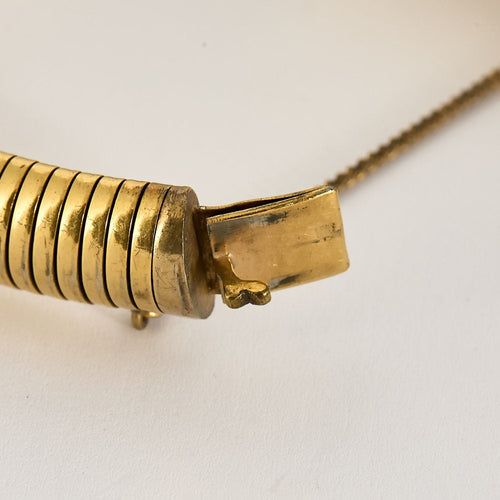 Bracelet Bracelet articulé en or jaune à maille tubogas 58 Facettes NAR01282