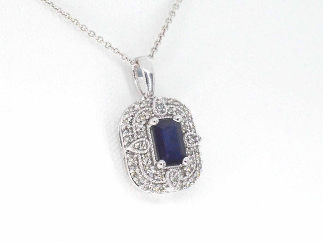 Pendentif Pendentif en or blanc avec diamants et saphir 58 Facettes 2350