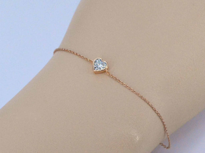 Bracelet Bracelet en or rose avec cœur en diamant 0,10 carat 58 Facettes 2234