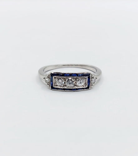 Bague 49 Bague jarretière art déco, platine diamants et saphirs calibrés 58 Facettes A02496