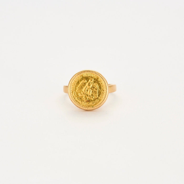 Monete d'oro con anello in oro giallo