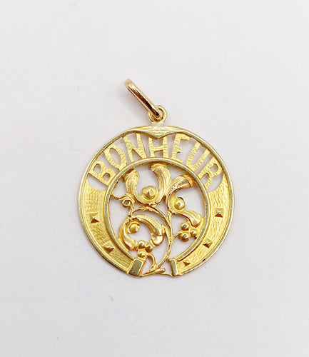 Pendentif Pendentif Art Nouveau or jaune BONHEUR fer à cheval et branche de gui (circa 1920) 58 Facettes A06259