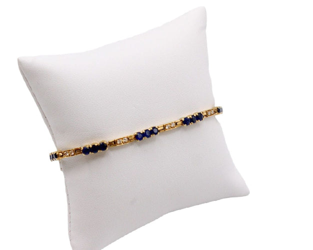 Bracelet Bracelet rivière de diamants et de saphirs, or jaune 58 Facettes 240045