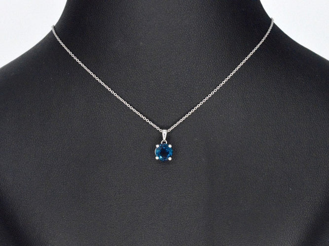 Pendentif Pendentif en or blanc avec topaze 58 Facettes 2331