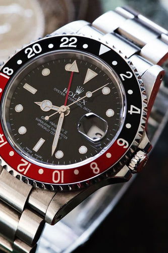 Montre Rolex GMT-Master II 16710 “Coke” rouge et noire, full set 58 Facettes