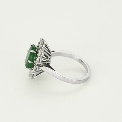 Bague 50 Bague marguerite en or blanc, émeraude et diamants 58 Facettes B250523