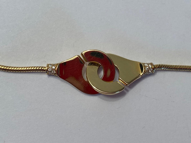 Collier DINH VAN - Collier Menottes en or jaune 58 Facettes