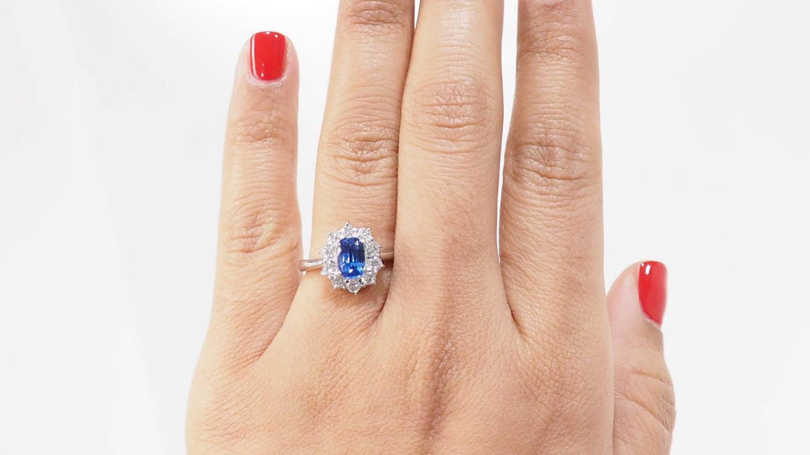 Bague 57 Bague marguerite en platine, tanzanite et diamants 58 Facettes 32520