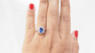 Bague 57 Bague marguerite en platine, tanzanite et diamants 58 Facettes 32520