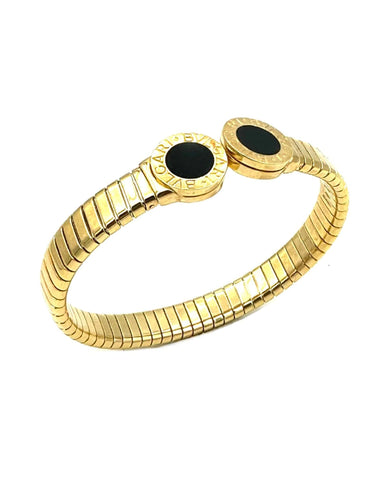 Bracelet BVLGARI. Collection "Tubogas", bracelet or jaune et onyx 58 Facettes