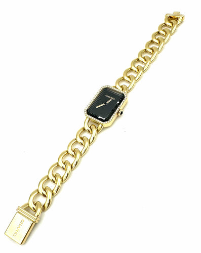 Montre CHANEL. Collection "Première chaine gourmette", montre en or jaune 18K 58 Facettes