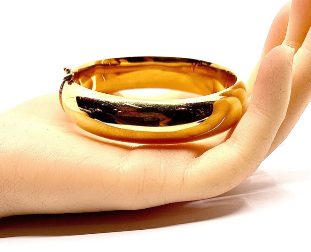 Bracelet Bracelet jonc en or 18 carats ouvrant, modèle lisse. 58 Facettes