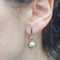 Boucles d'oreilles Boucles d'oreilles en perles vertes de Tahiti, or blanc et brillants 58 Facettes T105