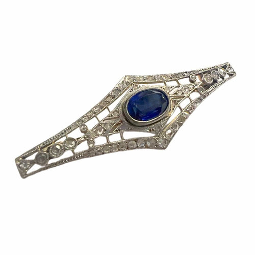 Broche Broche Art Déco des années 1930 en or 18 kt et platine avec diamants et saphir synthétique 58 Facettes A2602