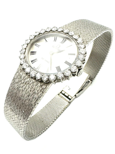 Montre OMEGA. Collection "De Ville", montre de dame vinatge or et diamants 58 Facettes