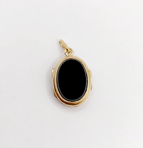 Pendentif Pendentif porte-photo or jaune et onyx (circa 1900) 58 Facettes A05916