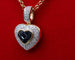Pendentif Pendentif coeur or bicolore, saphirs, diamants 58 Facettes 250253