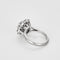 Bague 49 Bague marguerite en or blanc, platine et diamants 58 Facettes B250467