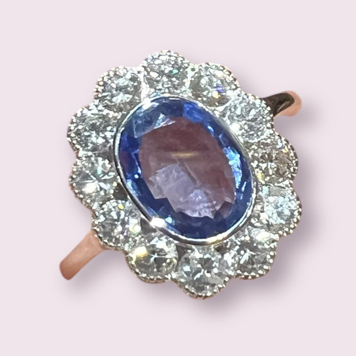 white gold ring with sapphire and brilliant surround