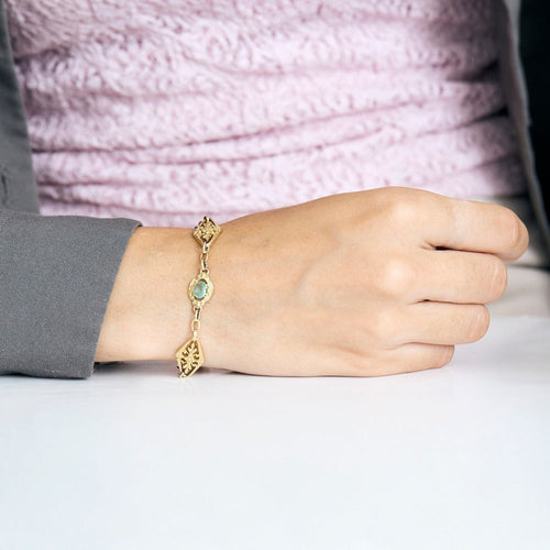 Bracelet Bracelet en or jaune, saphir, topaze rose, émeraude et diamant 58 Facettes PER1612