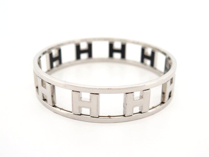 Bracelet bracelet HERMES rondo ash h rotatifs 20cm acier paladie & laque noir 58 Facettes 264585