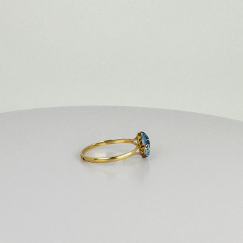 Bague Bague en or jaune avec topaze bleue ovale 58 Facettes 2508021