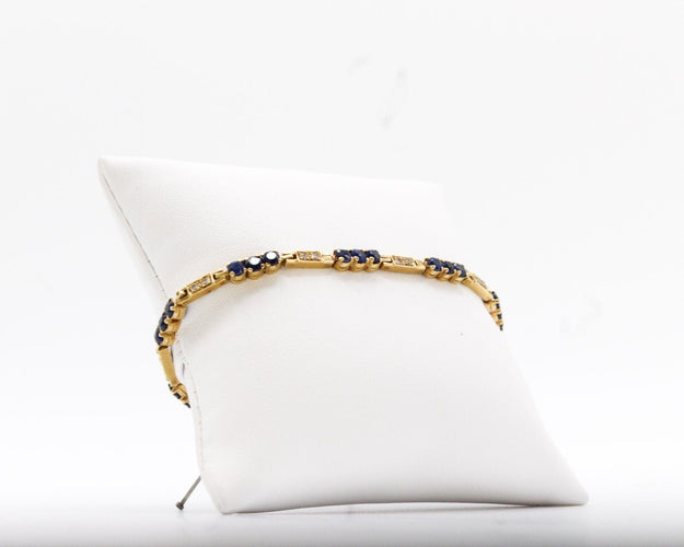 Bracelet Bracelet rivière de diamants et de saphirs, or jaune 58 Facettes 240045