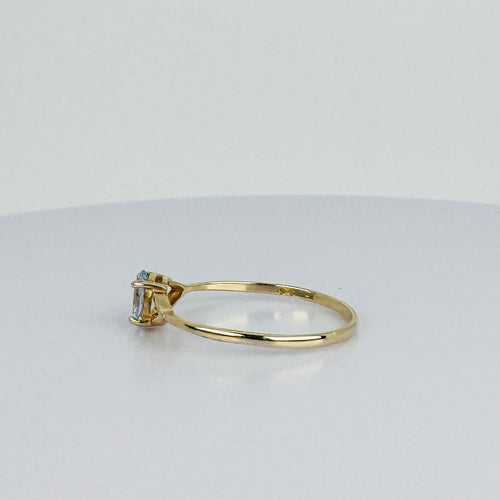 Bague 59.5 Bague en or jaune avec aigue-marine ovale naturelle bleu clair 58 Facettes 2508022