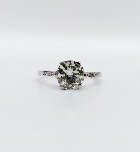 Bague 48 Bague solitaire art déco, platine et diamants 58 Facettes A05538