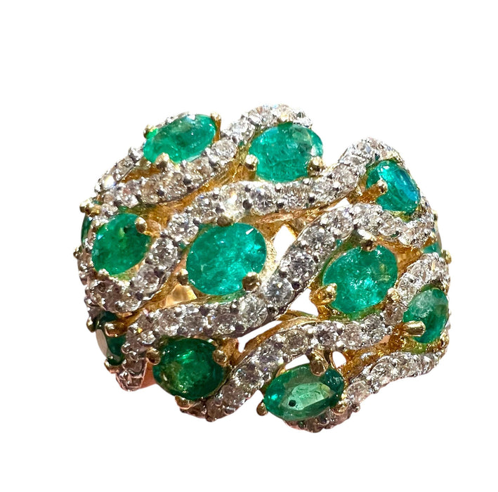 yellow gold ring with emeralds and diamonds