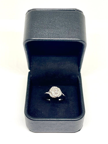 Bague 60 Bague or blanc en forme de rose et diamants 58 Facettes