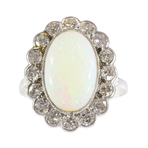 Bague 60 Élégance classique : le charme intemporel d’une bague en opale vintage des années 1950 58 Facettes 17226-0017