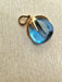 Pendentif POMELLATO - Pendentif Veleno or jaune et topaze bleue 58 Facettes