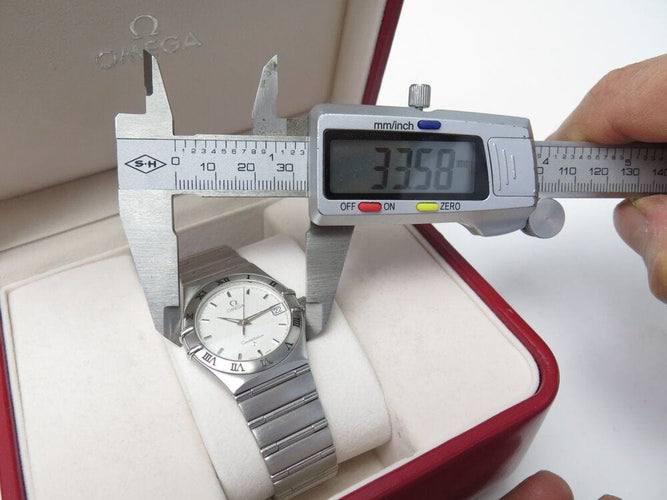 Montre montre OMEGA constellation 15123000 33mm acier quartz fullset lady 58 Facettes 266979