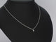 Collier Collier en or blanc avec diamant 58 Facettes 2352