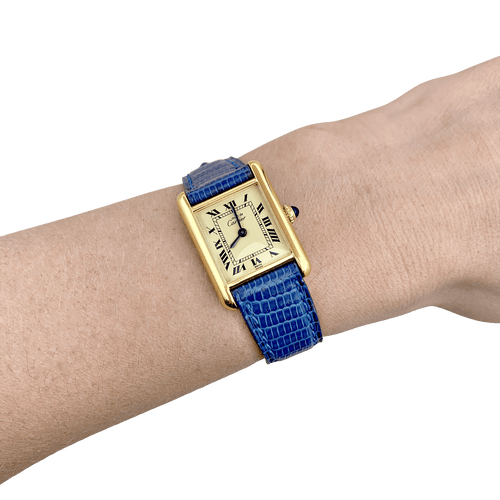 Montre Montre Cartier "Tank Must" argent plaqué or, cuir. 58 Facettes 34339