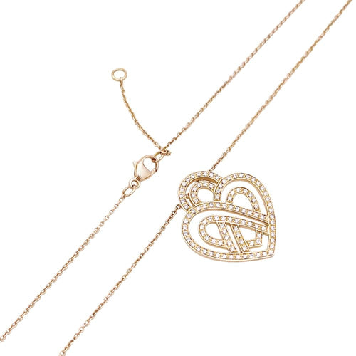 Collier Collier Poiray, "Coeur entrelacé", or rose et diamants. 58 Facettes 35035