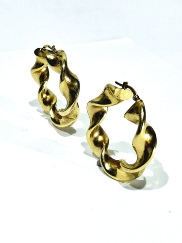 Boucles d'oreilles Paire de créole torsadées en or 58 Facettes