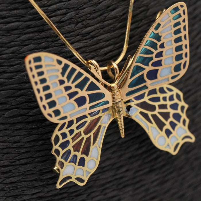 Butterfly in gold and enamel. Dual function