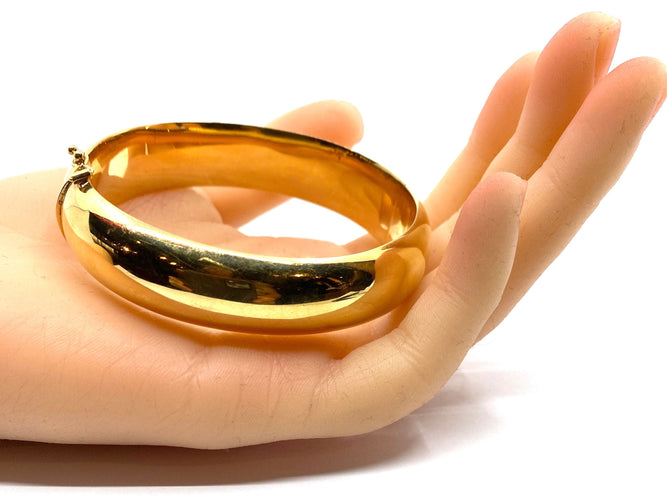 Bracelet Bracelet jonc en or 18 carats ouvrant, modèle lisse. 58 Facettes