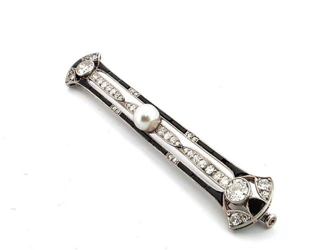 Broche Broche Art Déco des années 1920 en platine, ornée de diamants et d'une perle centrale 58 Facettes