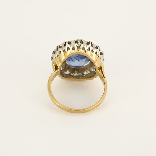 Bague 57 Bague marguerite en or blanc et or jaune centrée d'un saphir de 9cts et diamants 58 Facettes