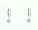 Boucles d'oreilles Boucles d'oreilles en or blanc en forme de cœur serties de diamants de 0,14 ct 58 Facettes 10688