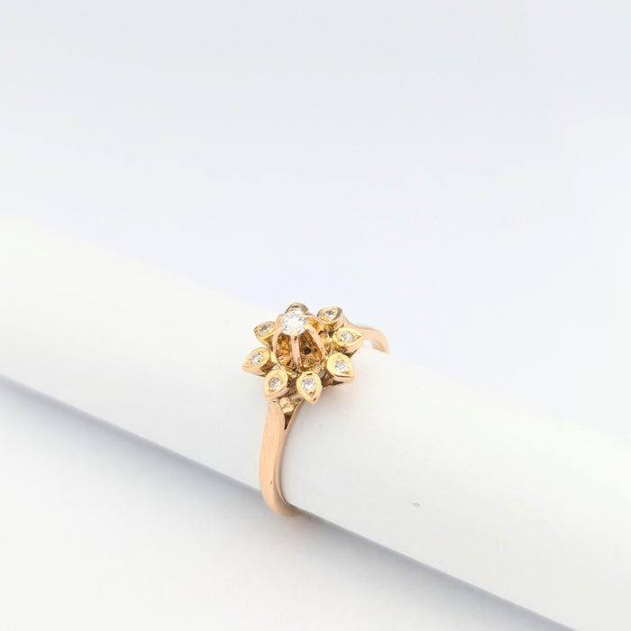 Yellow gold floral ring with diamonds