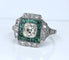 Art Deco cushion ring in platinum and diamonds, emeralds 