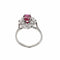 Bague 50 Bague marguerite en or blanc 18 carats, rubis et diamants 58 Facettes