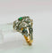 Bague Bague en or avec diamants et une émeraude 58 Facettes 50288