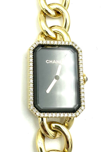 Montre CHANEL. Collection "Première chaine gourmette", montre en or jaune 18K 58 Facettes