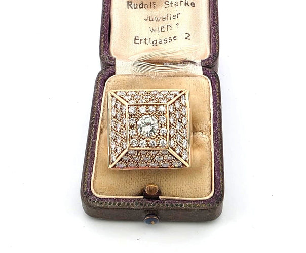 Anello oro giallo massiccio con diamante centrale e diamanti su struttura piramidale 58 Facettes