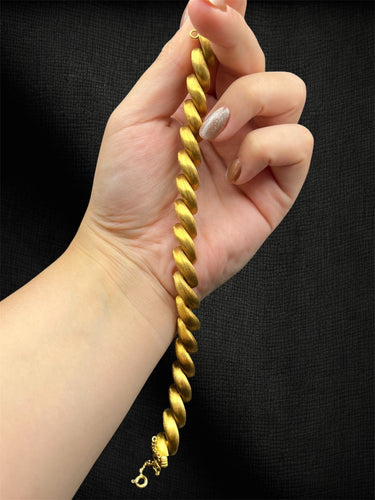 Bracelet Bracelet tressé plaqué or 18 carats 58 Facettes